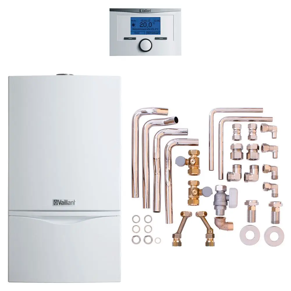 Vaillant Heizungsanlage mit einem weißen Gehäuse, angeschlossen an diverse Kupferrohre und Armaturen, einschließlich eines digitalen Thermostats im Hintergrund.